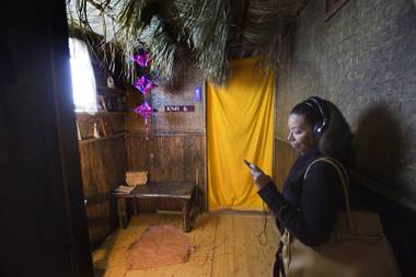 Patricia Jones looks over a room in the “Compassion Experience,” a traveling interactive exhibit, outside The Crossing Church Las Vegas Sunday, Jan. 15, 2017. This tour featured Kiwi, a girl from the&nbsp;Philippines.