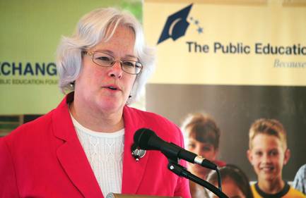 In this Sept. 9, 2011, file photo, Clark County School Board member Carolyn Edwards speaks at a news conference.