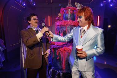 Producer Howie M. Howie (left) and Spiegelworld founder Ross Mollison celebrate Opium‘s one-year anniversary March 12 at the&nbsp;Cosmopolitan.